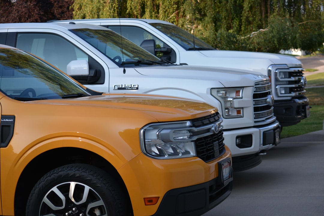 services-01 a-row-of-trucks-parked-next-to-each-other-rguv9vhz9ko